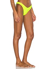 Luli Fama High Leg Brazilian Bikini Bottom In Neon Yellow REVOLVE