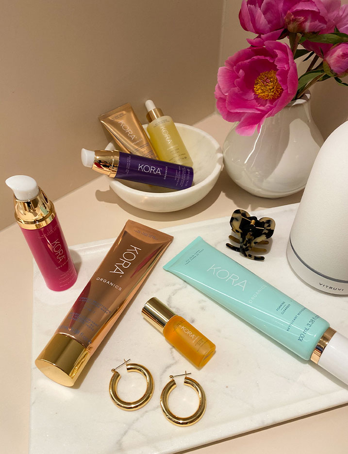 Bath necessities on a marble countertop. Shop Bath + Body.