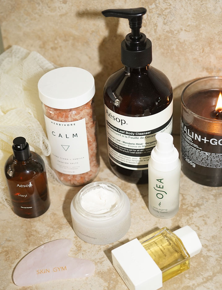 Bath necessities on a marble countertop. Shop Bath + Body.