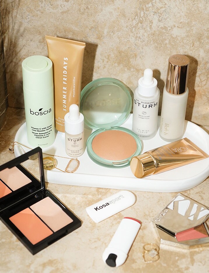An array of clean beauty products laid out on a countertop. Shop Clean Beauty.