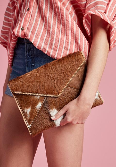 Leo Calf Hair Clutch in Sand