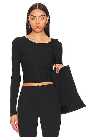Clubhouse cropped jacket in black - Alo Yoga
