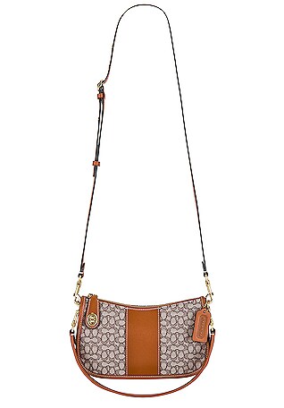 COACH Signature Jacquard Swinger in Pink