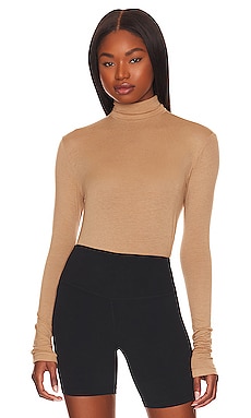 Product image of ALALA Washable Cashmere Turtleneck. Click to view full details