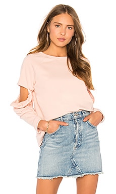 Central Park West Clover Cut Out Ruffle Sweatshirt in Blush | REVOLVE