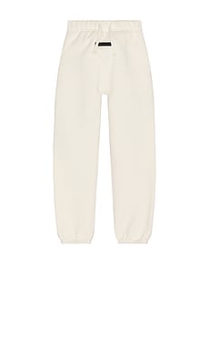 Fear of God ESSENTIALS Kids Classic Sweatpant in Shell from Revolve.com