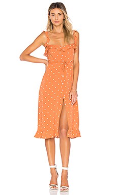 orange dress with white polka dots
