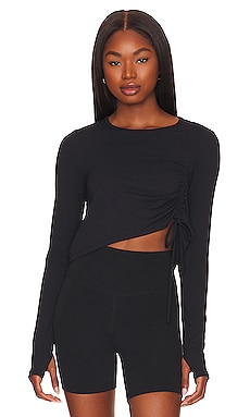 Product image of KORAL Zina Cropped Long Sleeve Top. Click to view full details