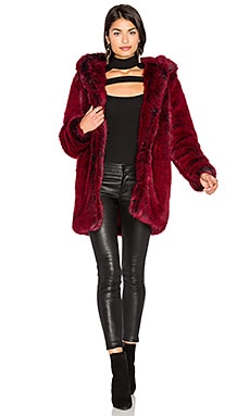 red hooded faux fur coat