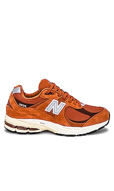 New Balance 2002r Sneaker in Rust Oxide | REVOLVE