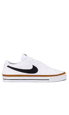 Nike Dunk Low Retro Sneaker in White, Black Summit, & White | REVOLVE