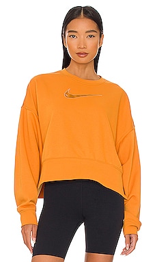 Nike Fleece Crewneck in Light Curry & Pearl White from Revolve.com