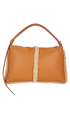 FAUX SHEARLING PUFFIN 백 Simon Miller