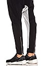 view 4 of 4 PANTALON ENTREJAMBE DESCENDU in Black/Transparent