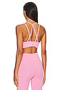 view 3 of 4 True Strength Medium Support Bra in Semi Pink Glow
