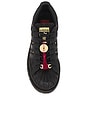 view 4 of 6 x Clot Lunar New Year Superstar Sneakers in Core Black, Carbon, & Gold