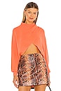 view 1 of 4 Mora Twist Cropped Long Sleeve Pullover in Deep Coral