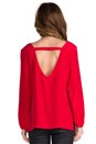 view 3 of 4 Trixie V Neck Cut Out Blouse in Cardinal