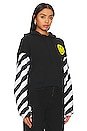 view 2 of 4 Caution Stripe Sleeve Smiley Relaxed Hoodie in Black & White