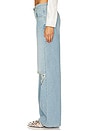 view 3 of 6 Distressed Crystal Relaxed Slit Jean in Medium Blue