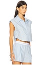 view 2 of 4 Cropped Button Down Sleeveless Shirt With Necklace in Oxford Blue