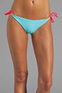 view 1 of 5 Raglan Reversible String Bikini Bottom en Army/Versliia/Bunny in Army & Versliia & Bunny