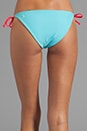 view 4 of 5 Raglan Reversible String Bikini Bottom en Army/Versliia/Bunny in Army & Versliia & Bunny