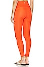 view 3 of 4 Powerbeyond Strive High Waisted Midi Legging in Sunset Orange