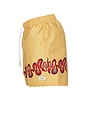 view 3 of 6 Ochre Dizzy Boa Swim Trunks in Yellow