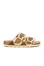 view 1 of 5 Arizona Big Buckle Shearling Sandal in Cognac & Sandcastle