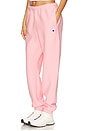 view 3 of 6 Essentials Reverse Weave Cinched Bottom Sweatpant in Coral Glow