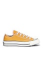 view 1 of 6 Chuck 70 Canvas Low Tops in Sunflower, Black, & Egret