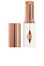 view 1 of 7 Unreal Skin Sheer Glow Tint Hydrating Foundation Stick in 9 Tan