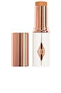 view 1 of 7 Unreal Skin Sheer Glow Tint Hydrating Foundation Stick in 10 Tan