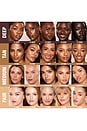 view 5 of 6 BASE DE MAQUILLAJE UNREAL SKIN SHEER GLOW TINT HYDRATING FOUNDATION STICK in 13 Deep