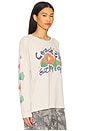 view 3 of 5 Collage Merch Long Sleeve Tee in Dirty White