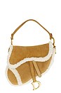 view 1 of 8 Dior Shearling Saddle Bag in Tan