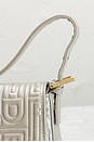 view 7 of 9 Fendi Logo Embossed Baguette Shoulder Bag in Silver