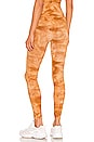 view 3 of 4 X FP Movement Good Karma Tie Dye Legging in Burnt Topaz