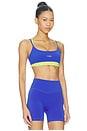 view 2 of 4 Criss Cross Layered Sports Bra in Cobalt & Lime