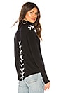 view 1 of 5 Pippa Lace Up Turtleneck in Black
