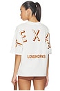 view 1 of 5 The University Of Texas At Austin Football Oversized Tee in Burnt Orange in White & Burnt Orange