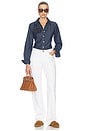 view 5 of 7 The 1990s Jean in White