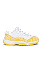 view 1 of 6 Air Jordan 11 Retro Low Sneaker in White, Tour Yellow, & White