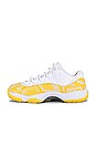 view 5 of 6 Air Jordan 11 Retro Low Sneaker in White, Tour Yellow, & White