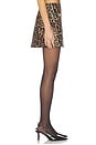 view 3 of 6 Cyra Low Rise Mini Skirt in Brown Multi Patch Leopard
