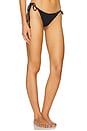 view 2 of 5 Seamless Wavy Ruched Back Brazilian Tie Side Bikini Bottom in Black