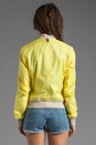 view 3 of 4 Meri Packable Rainwear Jacket in Neon Yellow