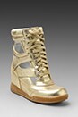 view 1 of 5 Metallic Cut Out Wedge Sneaker in Gold