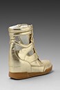 view 4 of 5 Metallic Cut Out Wedge Sneaker in Gold